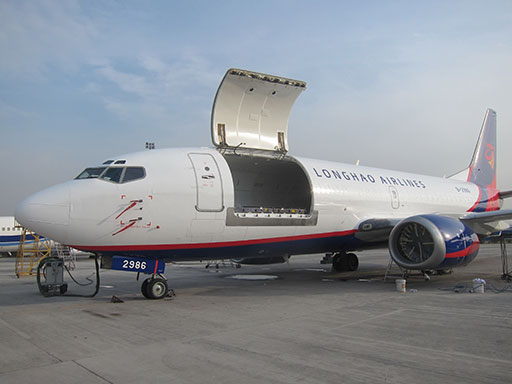 Pemco World Air Services (PEMCO) has redelivered its first B737-300 passenger-to-freighter converted aircraft to Guangdong Long Hao Aviation Group.  It features nine pallet positions, up to 43,100 pounds of payload, 4,600 cubic feet of total volume, and a max range exceeding 2,000 miles. (Photo: PEMCO)