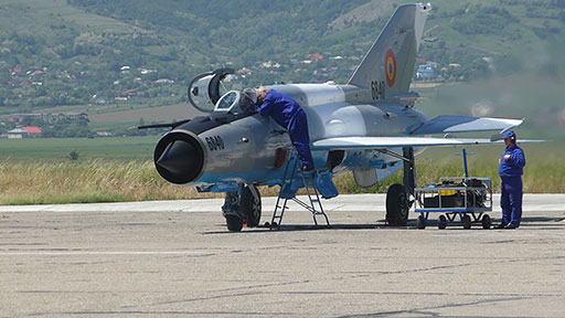 Not your average MRO facility. A Russian Air Force MIG-21 FenceR conducts an engine test on the apron before departing for a full flight check. (Photo: Andrew Drwiega). 