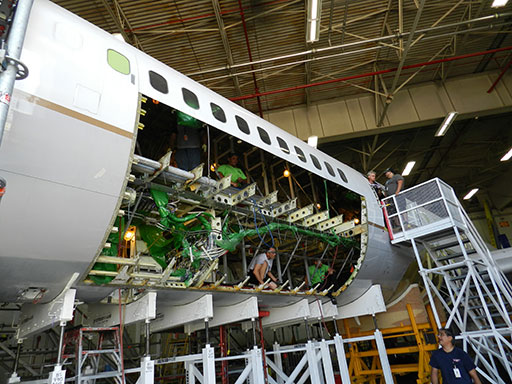 One of the first tasks in Precision’s B757-200PCF main cargo door installation is the lower sill removal and replacement. Precision manufactures its own main cargo door. (Photo: Precision Aircraft Services)