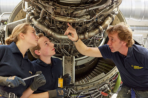 Apprentices Aircraft Mechanic Engines learning at a CF6 engine. 