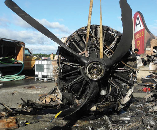 Photo 9: The No. 4 engine, as viewed at the accident site.