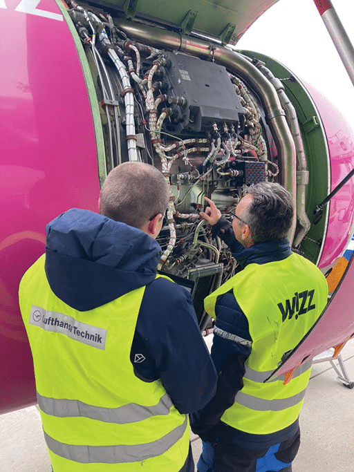 An Aviatar expert trains a Wizz Air engineer on the use of their Technical Logbook in Maintenance Mode. LHT image